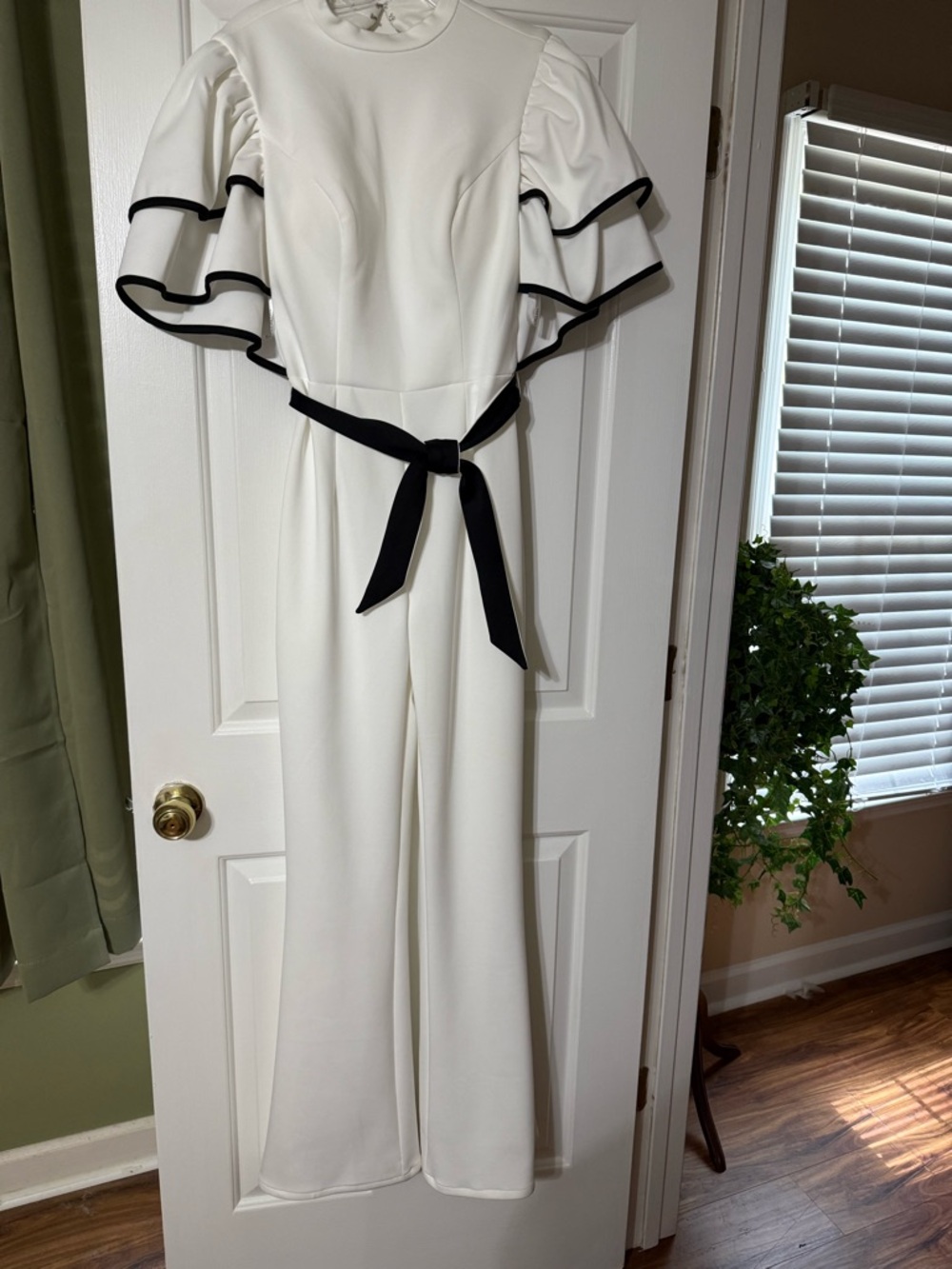 Rachel Allan White Jumpsuit with Black Trim and Belt